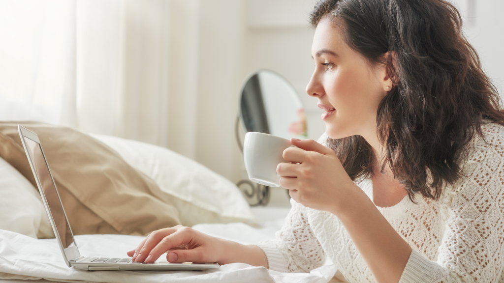 woman laptop cup of tea